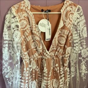 White lace dress, long lace sleeves, knee length